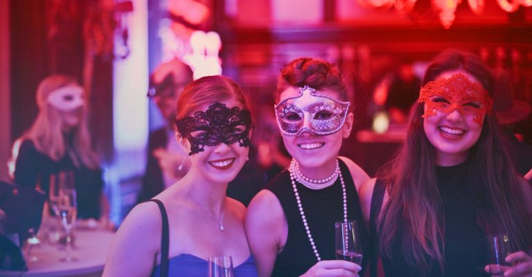 Creative Themed Party Ideas with three girls wearing Venetian masks at a themed party